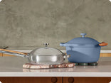 chrome titanium always pan pro and blue perfect pot on counter