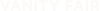 Translation missing: en.Faint, white capital letters spelling VANITY FAIR on a slightly lighter white background, creating a barely visible text effect