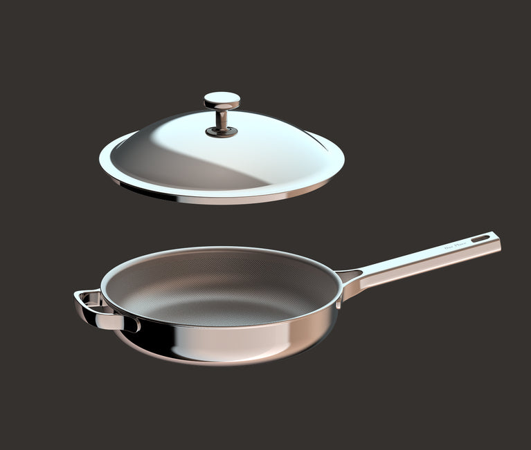 Stainless steel frying pan and lid hovering above it.